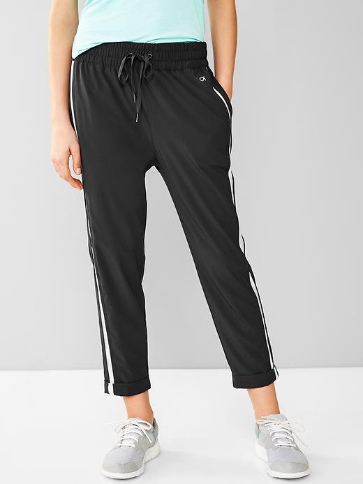 1 of 8 showing, with the color true black of product GapFit Studio stripe jogger pants