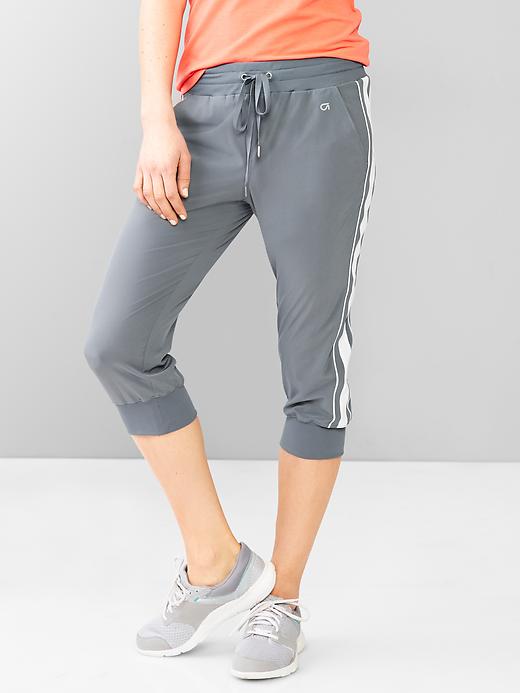 1 of 8 showing, with the color blue grey of product GapFit cropped woven joggers