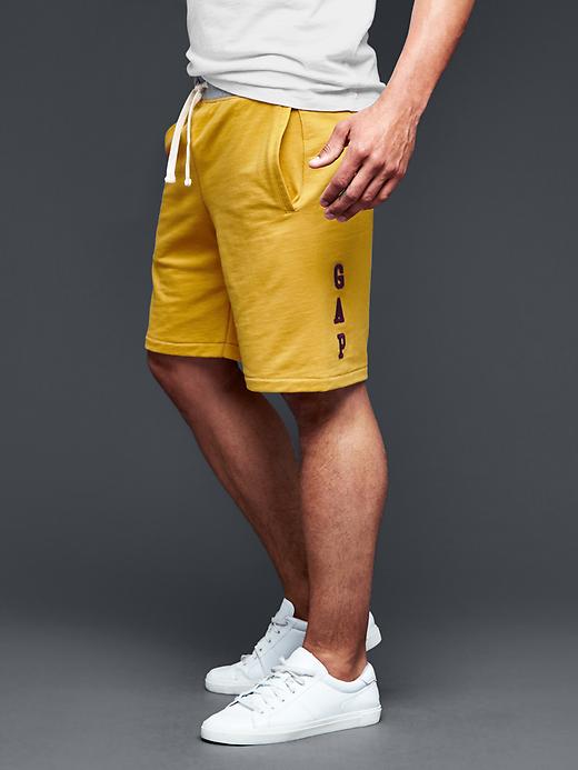 1 of 8 showing, with the color gold plate of product 1969 logo sweat shorts