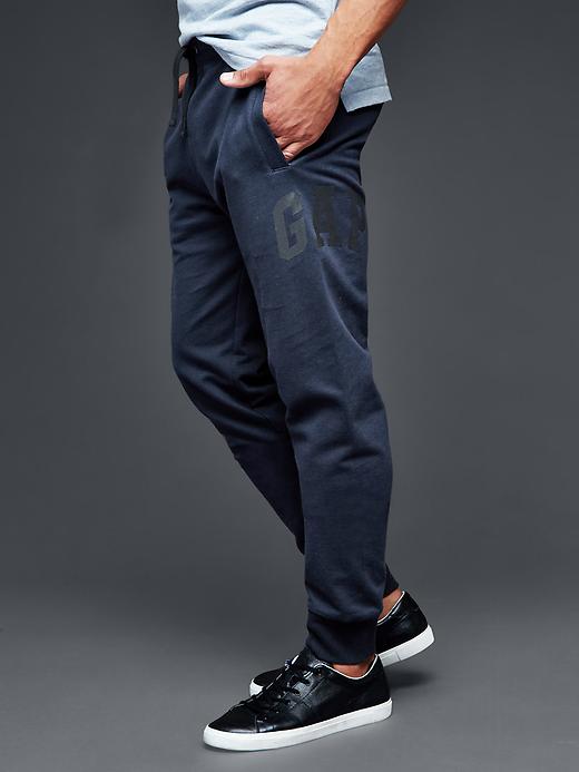 1 of 8 showing, with the color new classic navy of product Arch logo sweatpants