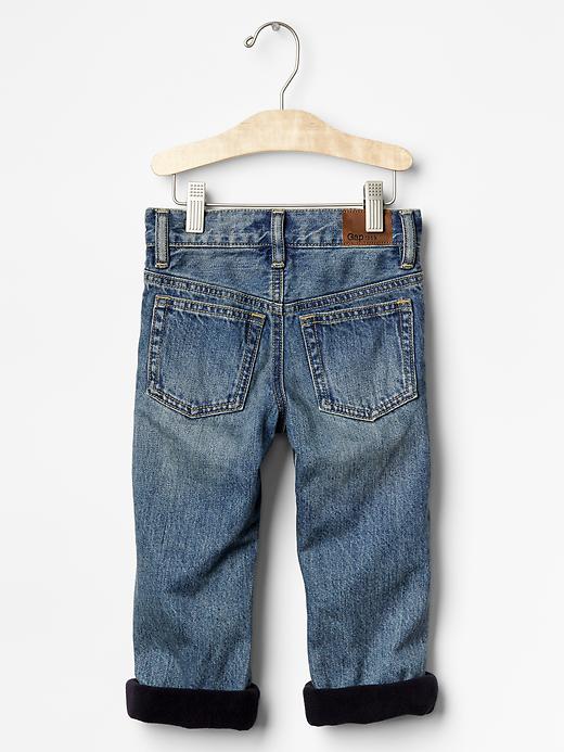 2 of 8 showing, with the color medium wash of product 1969 fleece-lined original fit jeans