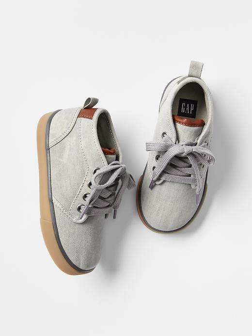 View large product image 1 of 1. Denim mid-top sneakers