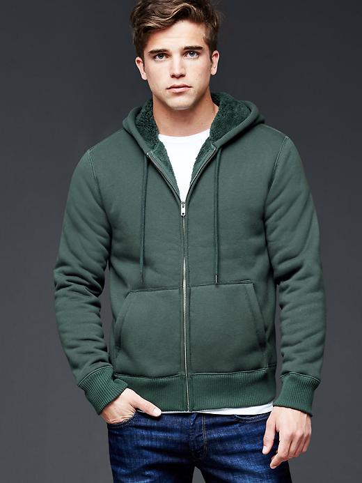 1 of 8 showing, with the color campus green of product Sherpa zip hoodie