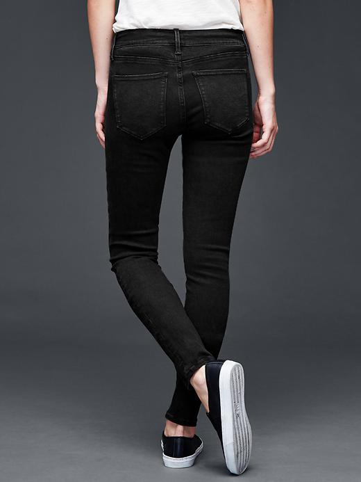 2 of 8 showing, with the color premier black of product Mid rise true skinny jeans