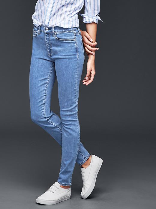 1 of 8 showing, with the color medium indigo of product STRETCH 1969 true skinny jeans