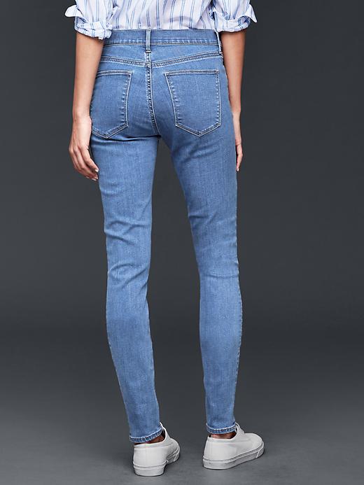 2 of 8 showing, with the color medium indigo of product STRETCH 1969 true skinny jeans
