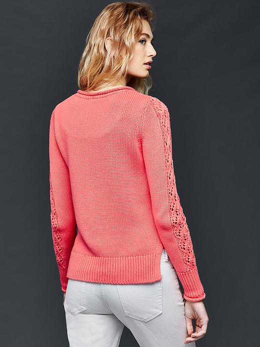 2 of 8 showing, with the color pink reef of product Side slit pointelle pullover sweater