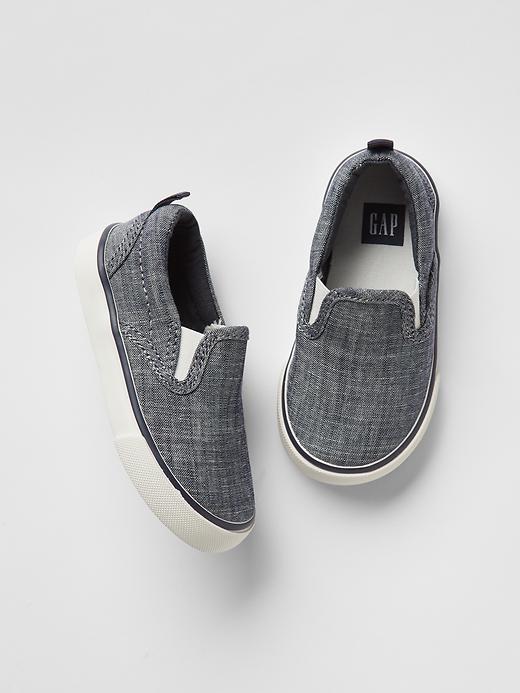 1 of 8 showing, with the color indigo chambray of product Toddler Chambray Slip-On Sneakers