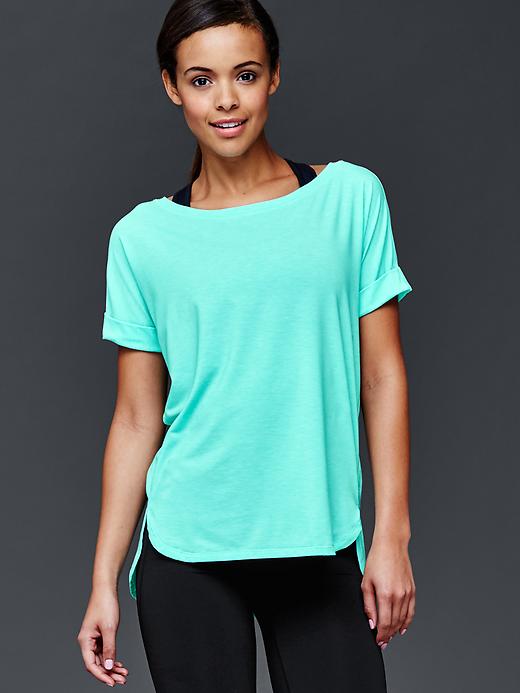 1 of 8 showing, with the color aqua tide of product GapFit Breathe roll sleeve tee