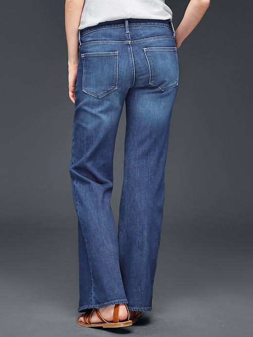2 of 8 showing, with the color dark indigo of product AUTHENTIC 1969 flare jeans