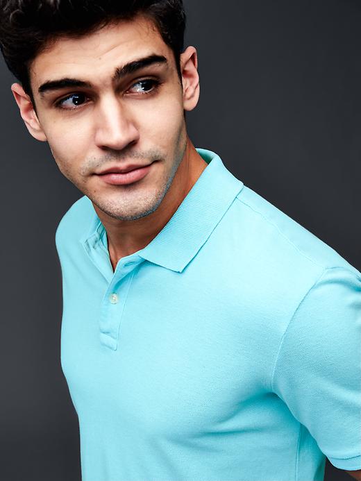 1 of 8 showing, with the color turquoise of product Solid piqué polo