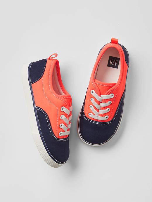 1 of 8 showing, with the color neon orange of product Classic slip-on trainers