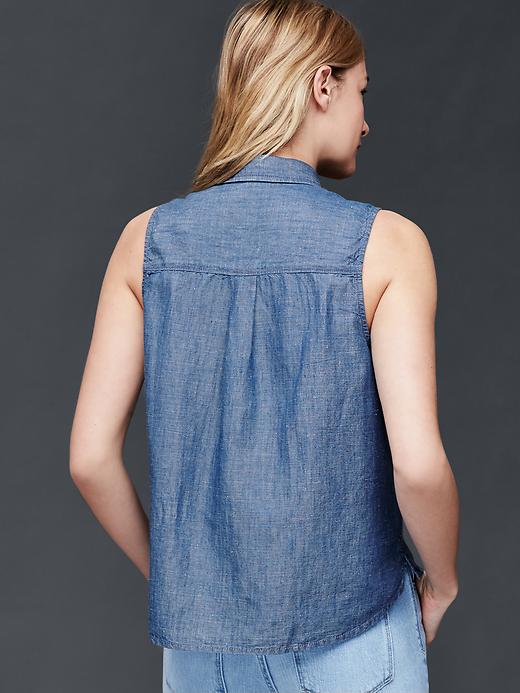 2 of 8 showing, with the color dark indigo of product 1969 sleeveless linen denim top