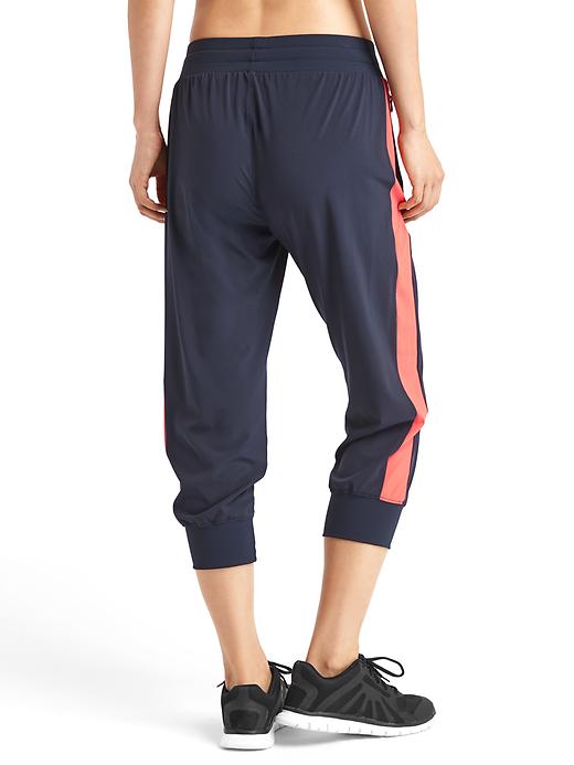 2 of 8 showing, with the color true indigo of product Studio zip joggers
