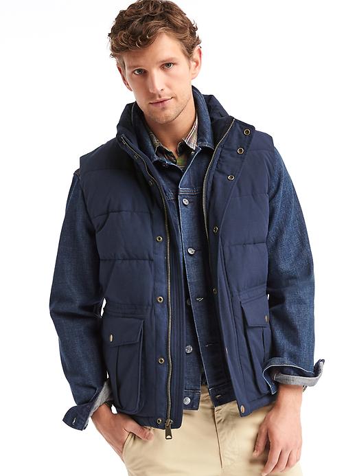 1 of 8 showing, with the color true indigo of product ColdControl Max heavyweight puffer vest