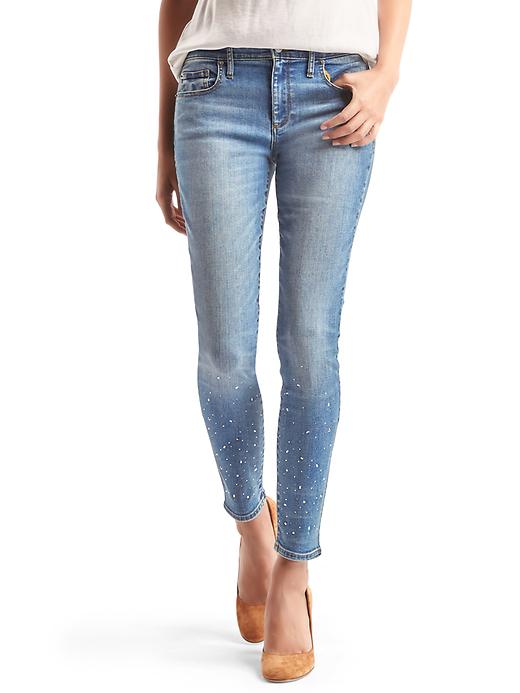 1 of 8 showing, with the color light indigo of product Mid rise gem-studded true skinny jeans