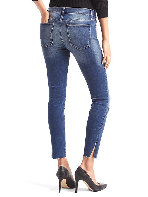 2 of 8 showing, with the color medium indigo of product STRETCH 1969 stud true skinny ankle jeans