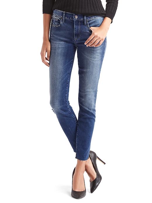 1 of 8 showing, with the color medium indigo of product STRETCH 1969 stud true skinny ankle jeans
