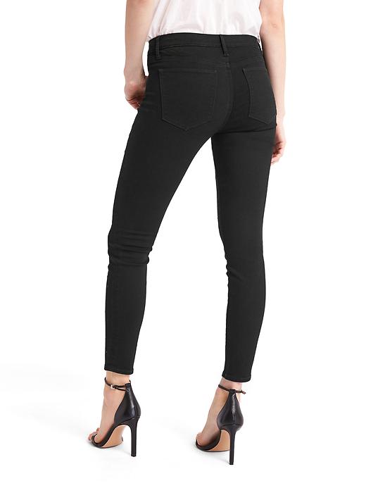 Image number 2 showing, Mid rise stud front true skinny jeans