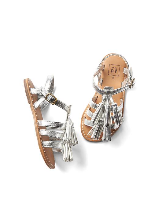 View large product image 1 of 1. Metallic tassel gladiator sandals