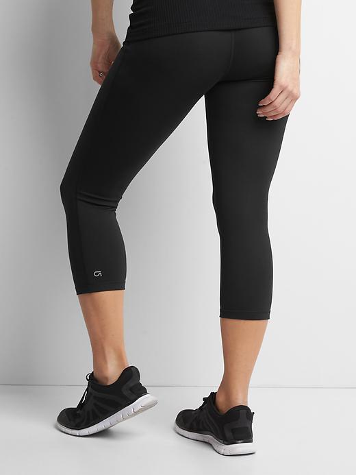 2 of 8 showing, with the color true black of product Maternity GapFit Blackout Full Panel Capris