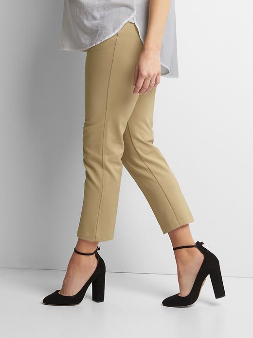 View large product image 1 of 1. Maternity demi panel slim crop pants