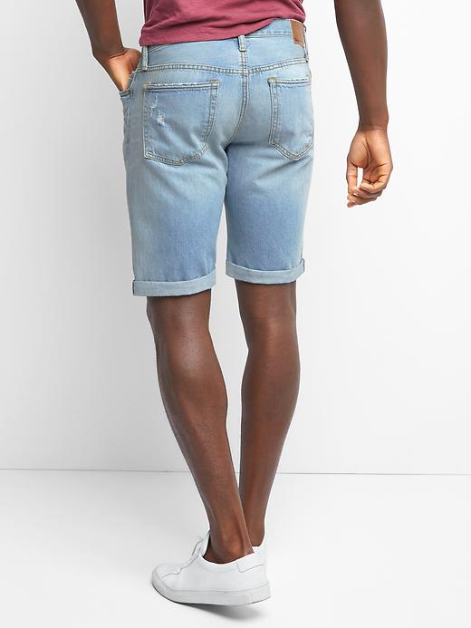 2 of 8 showing, with the color indigo of product Denim destructed shorts (10")