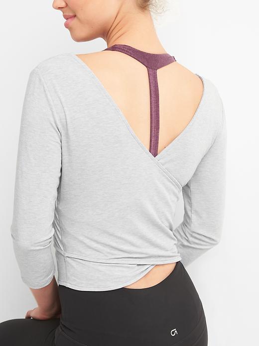 View large product image 2 of 6. Breathe wrap crop tee