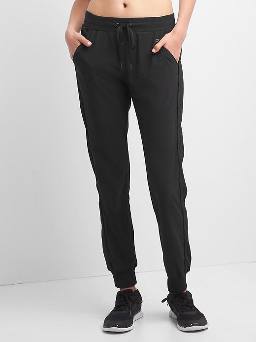 Image number 1 showing, GapFit Studio Side-Stripe Joggers