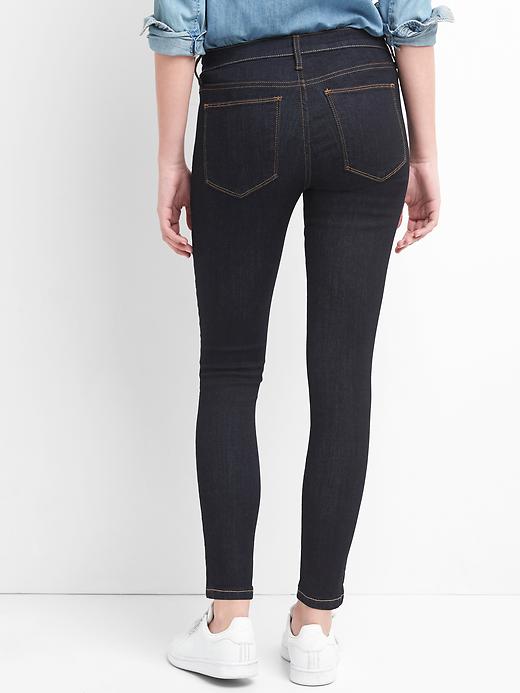 2 of 8 showing, with the color (Dark) Rinsed of product Mid Rise Favorite Ankle Jeggings