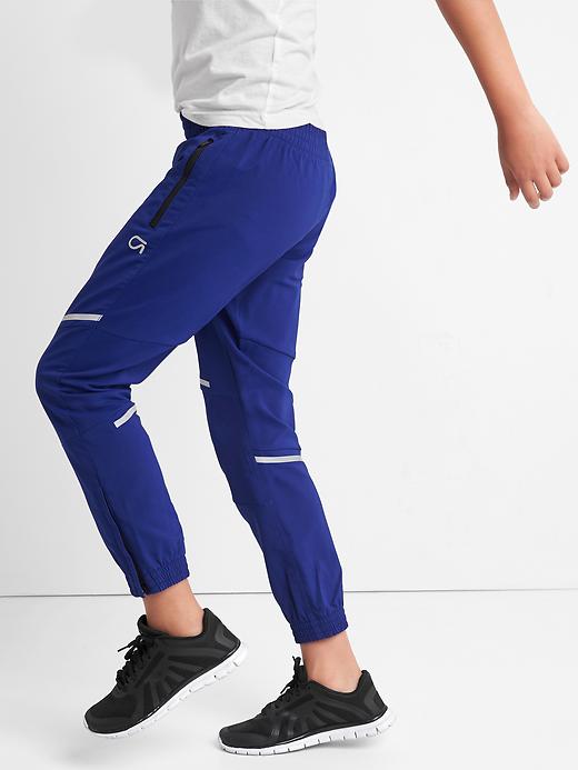 Image number 1 showing, GapFit kids reflective zip pants