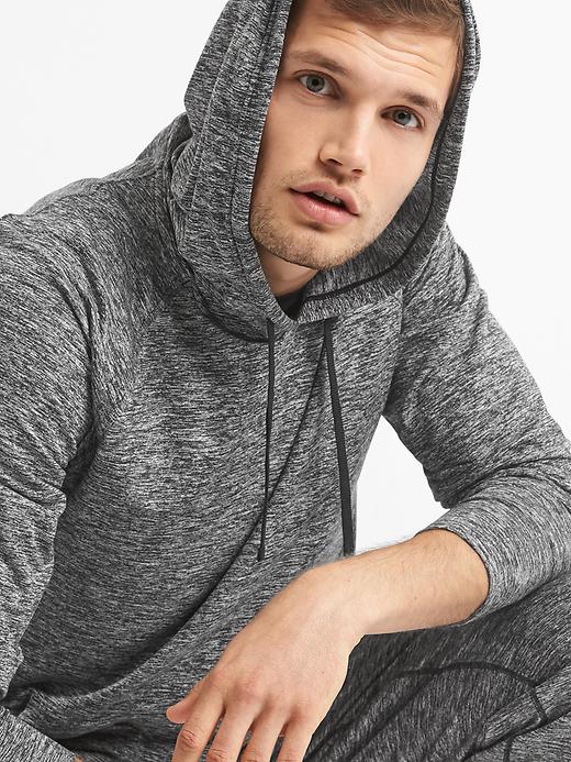 1 of 8 showing, with the color black heather of product GapFit brushed tech jersey hoodie