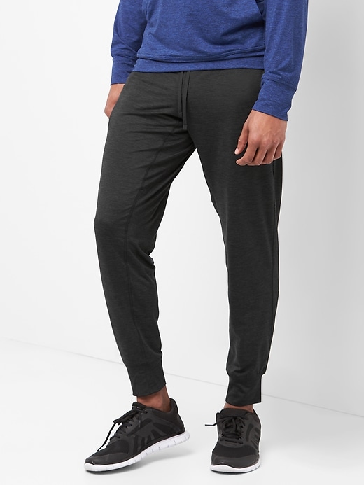 View large product image 1 of 1. GapFit brushed tech jersey joggers