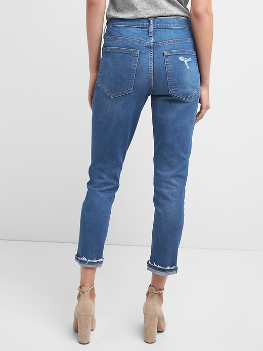 2 of 8 showing, with the color dark indigo of product Mid rise destructed best girlfriend jeans
