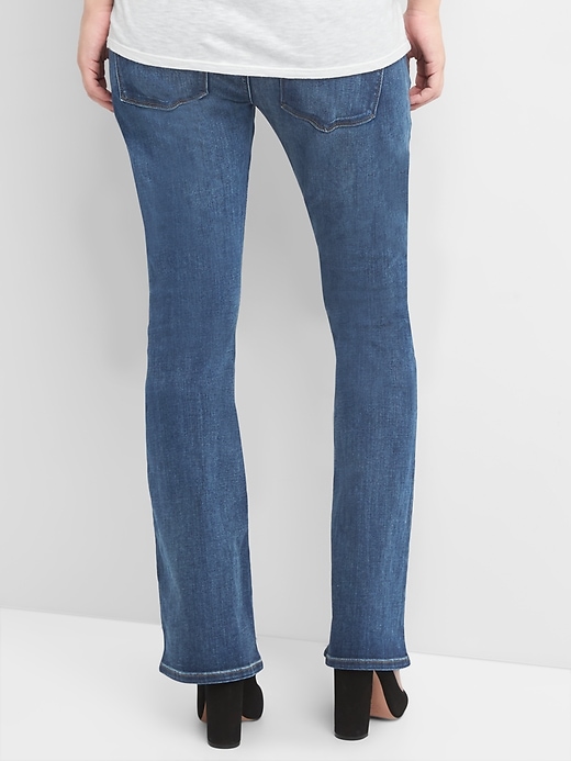 2 of 8 showing, with the color medium indigo of product Maternity demi panel baby boot jeans
