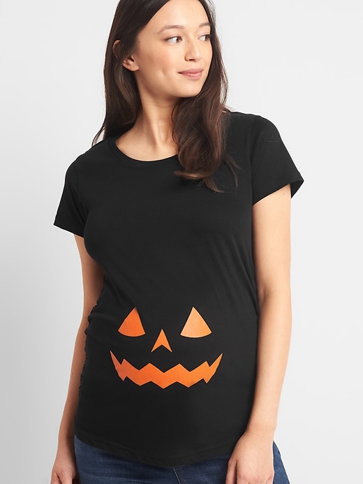 View large product image 1 of 1. Maternity graphic short sleeve tunic tee