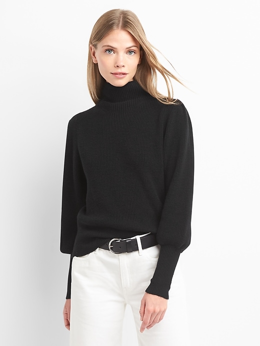1 of 8 showing, with the color true black of product Merino wool blend balloon sleeve mockneck sweater