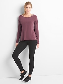 View large product image 5 of 7. GapFit Breathe long sleeve cross-back top