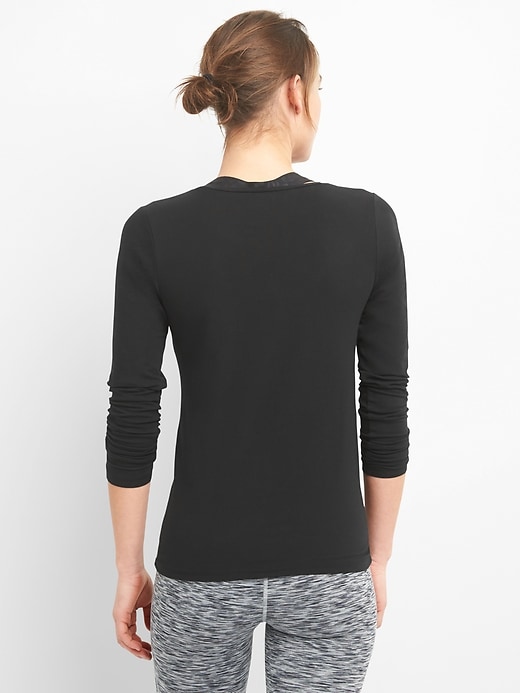 View large product image 2 of 5. GapFit Twist-Front Long Sleeve Top