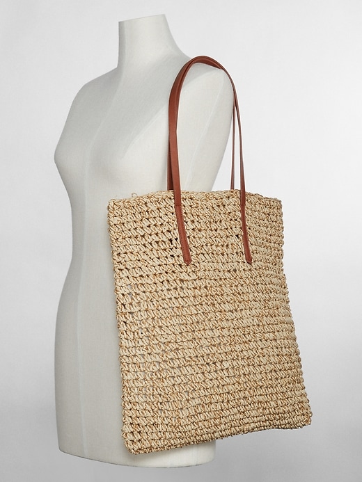 View large product image 2 of 3. Woven Metallic Straw Tote