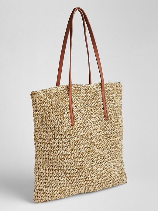 View large product image 1 of 3. Woven Metallic Straw Tote