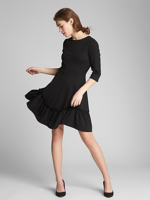 View large product image 1 of 1. Long Sleeve Ruffle-Hem Dress in Ponte