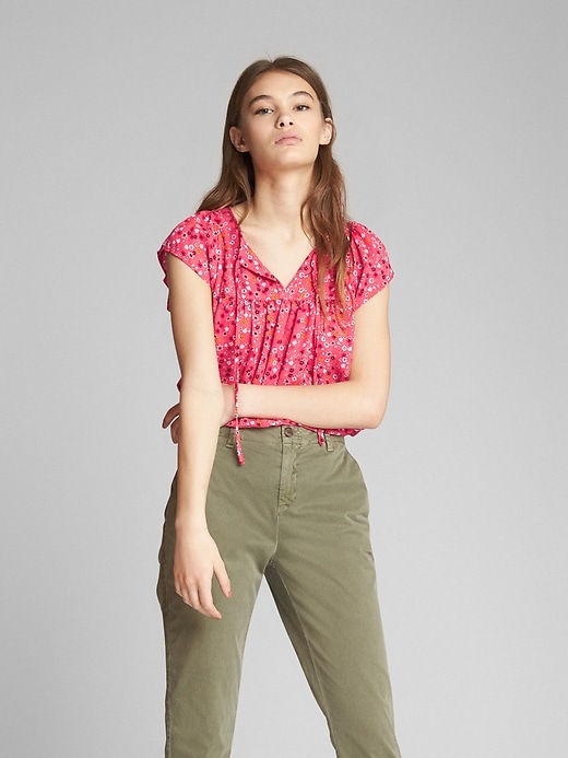 View large product image 1 of 1. Floral Short Sleeve Tie-Neck Blouse