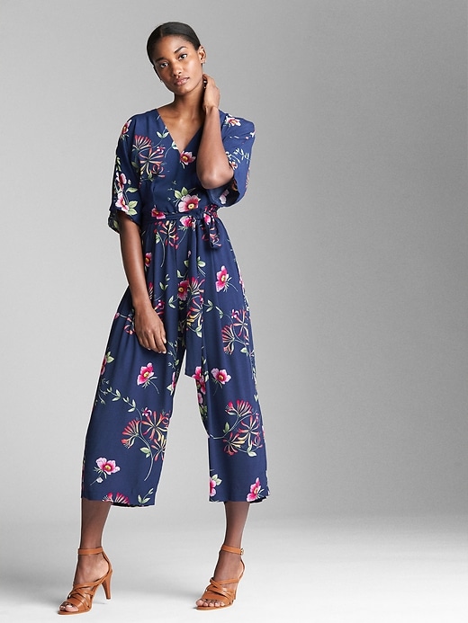 1 of 8 showing, with the color navy floral of product Short Sleeve V-Neck Jumpsuit