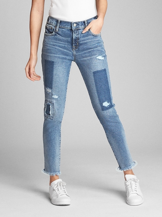 1 of 8 showing, with the color (Medium) Medium Indigo of product Mid Rise True Skinny Ankle Jeans with Laser-Patch Detail