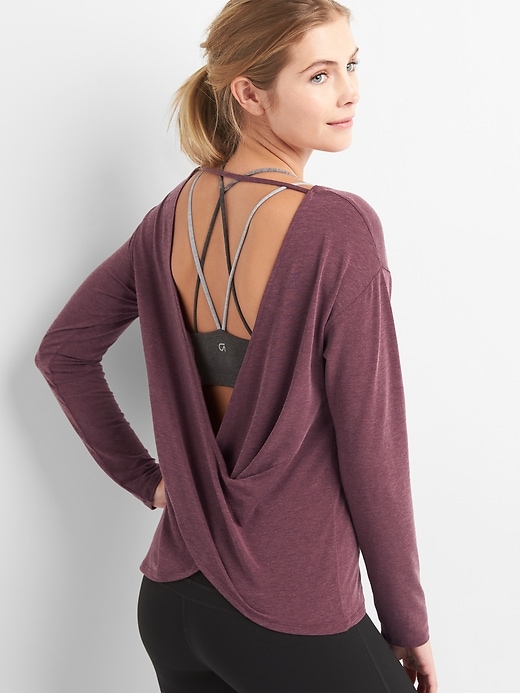 View large product image 1 of 7. GapFit Breathe long sleeve cross-back top