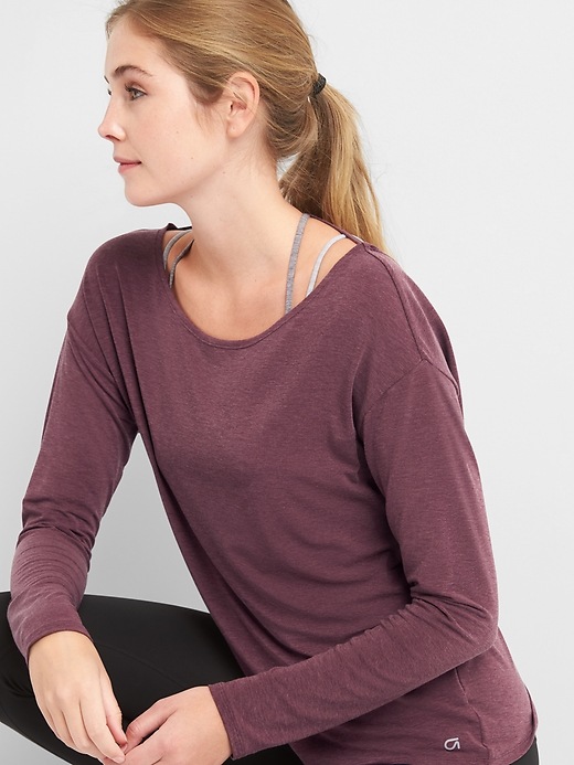 View large product image 2 of 7. GapFit Breathe long sleeve cross-back top