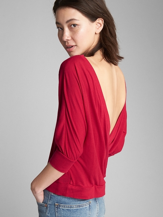 View large product image 1 of 1. Three-Quarter Sleeve Crossback Top