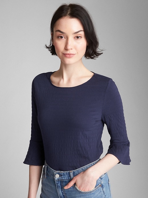 View large product image 1 of 1. Three-Quarter Bell Sleeve Top