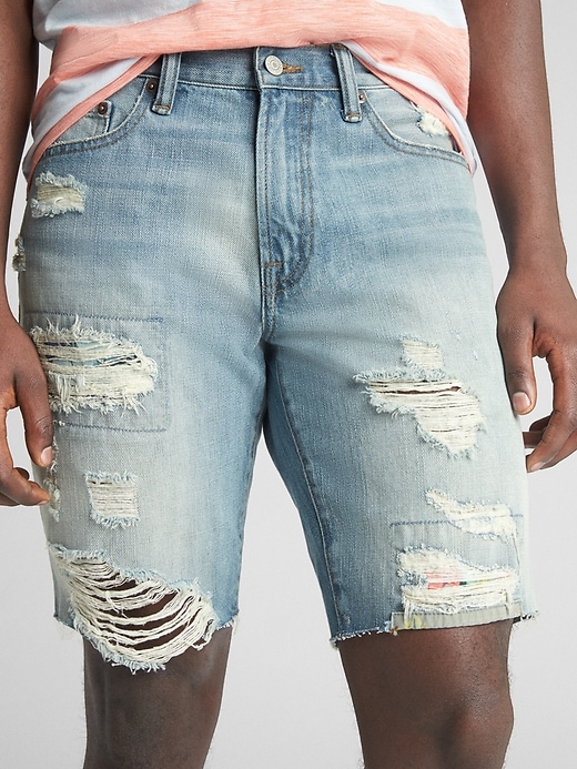 Image number 3 showing, 10" Destructed Slim Denim Shorts with Tropical Print
